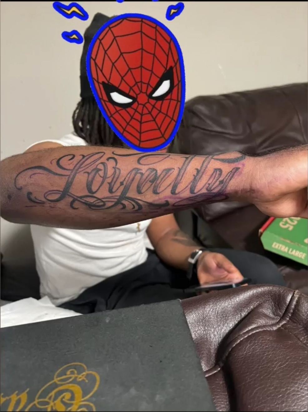 Fatz tattooing a loyalty script piece