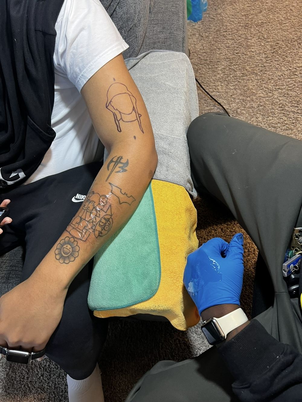 Stencil sketches on arm